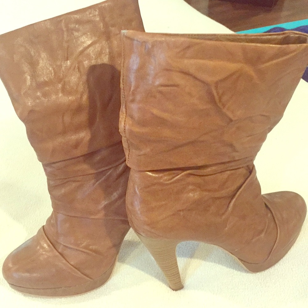 Boots by Jessica Simpson gently worn but look new